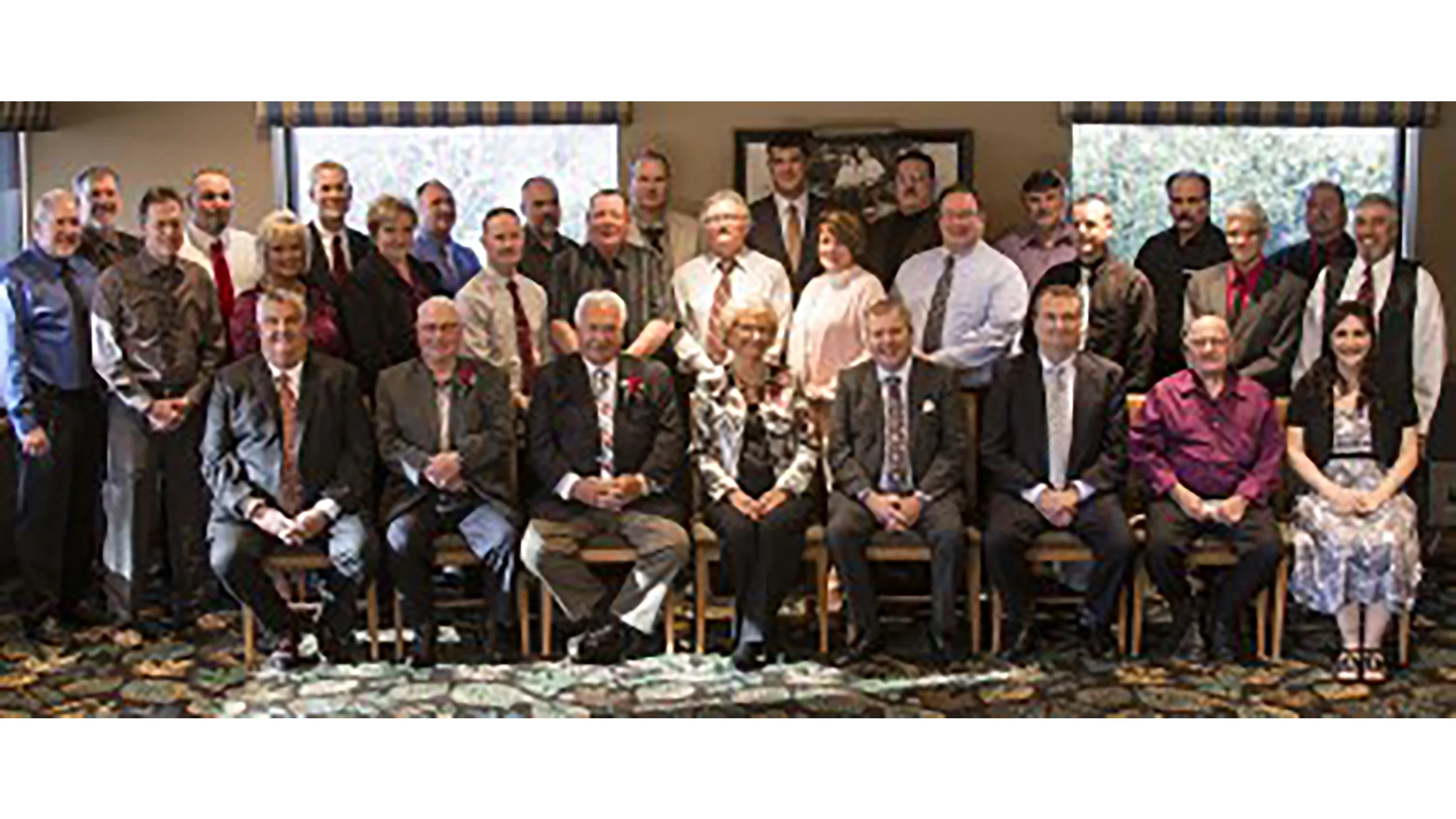 Michels family members and executives celebrate 25 year work anniversaries