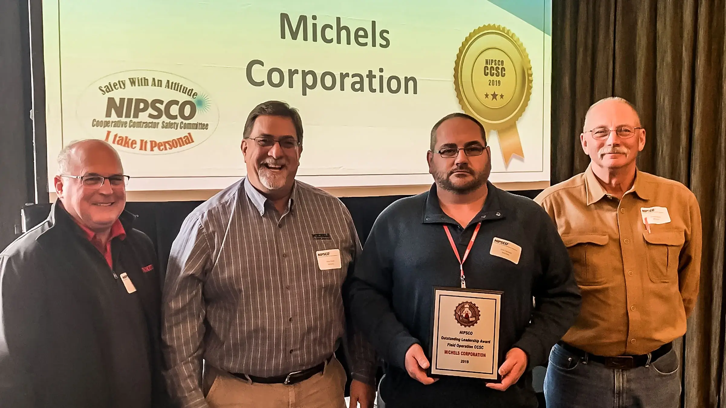 Michels accepting safety award