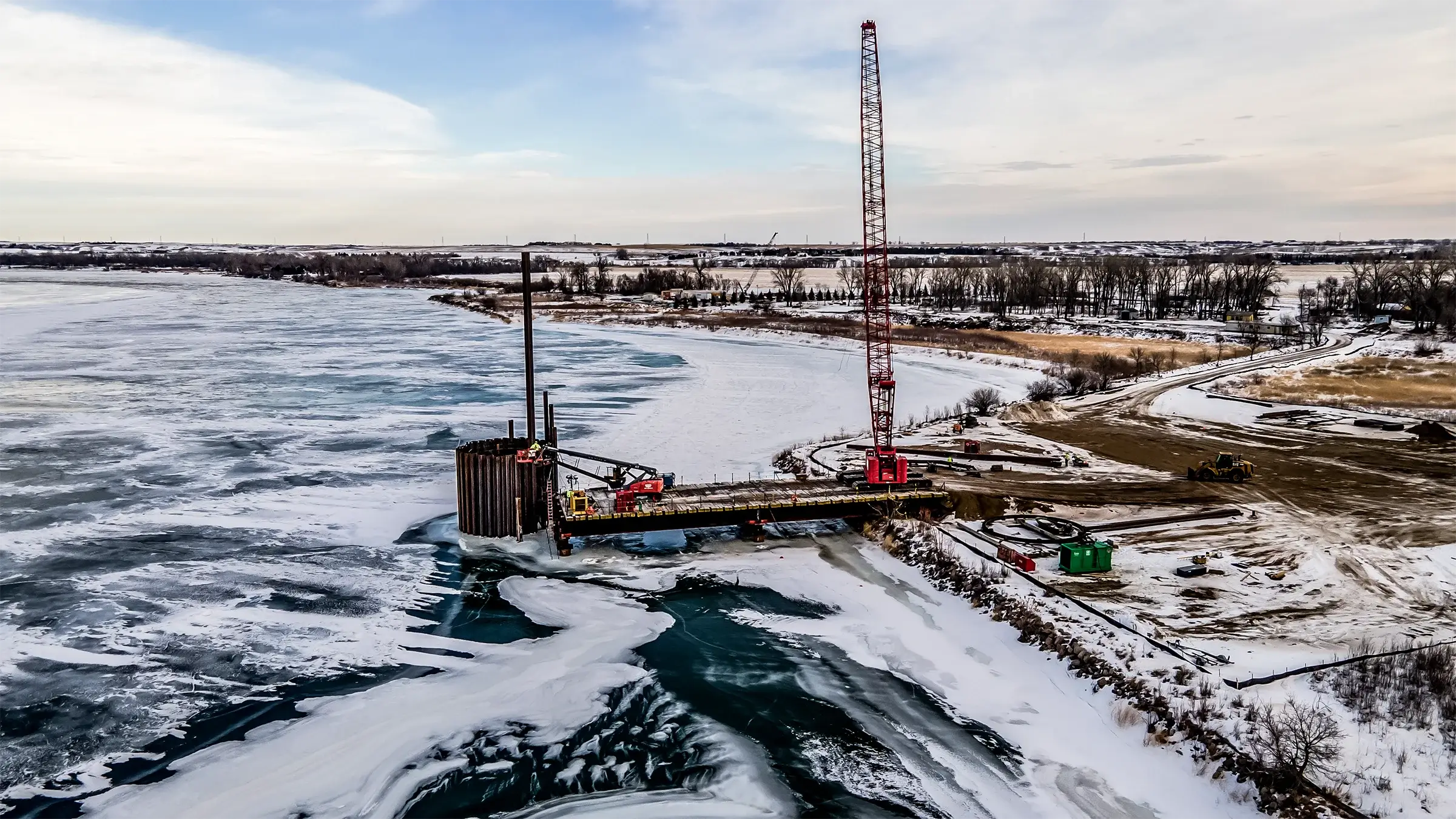 A crew builds a cofferdam on the Missouri River