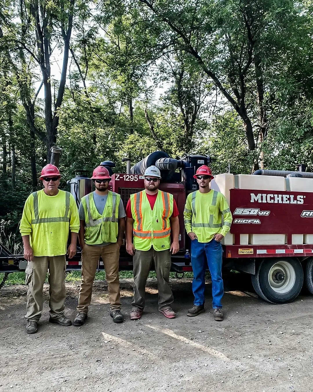 Crew aids injured bike rider, embodying Michels core values.