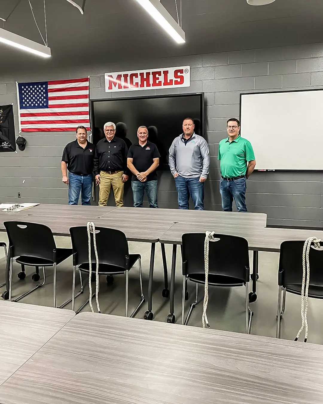 Employees opening a new training facility that supports power apprentices.