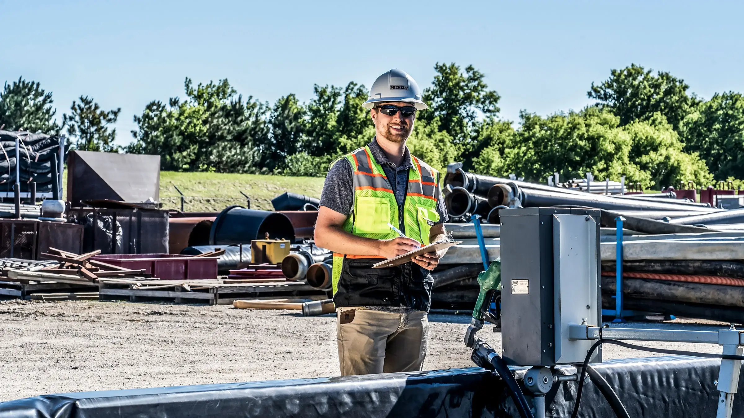 A Michels Environmental Specialist completes testing of a fuel pump