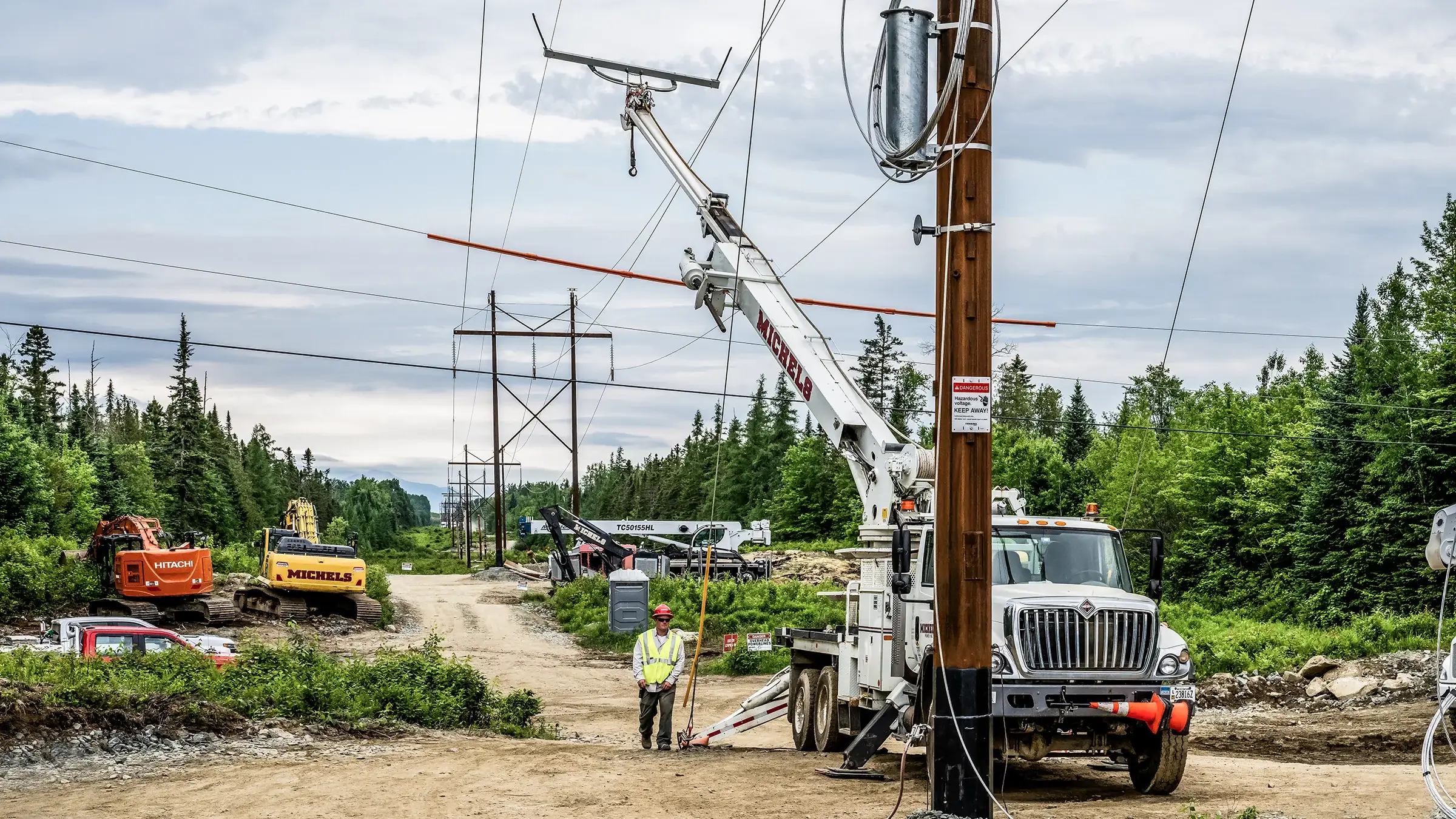 Specialized equipment is used to build a new electrical power transmission line
