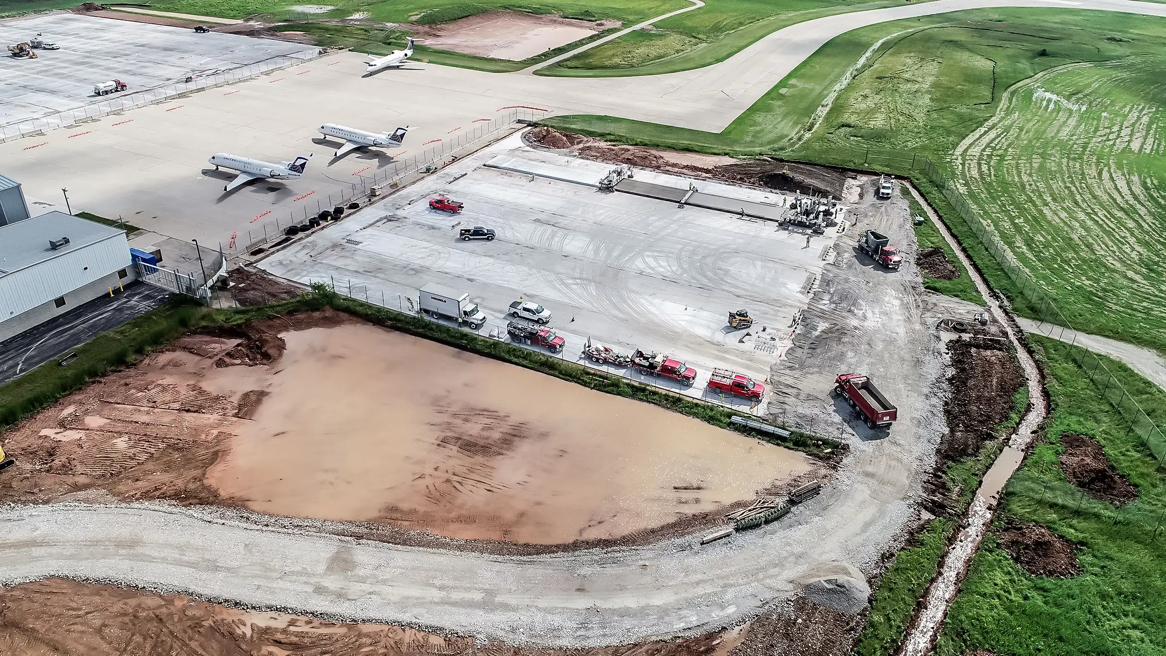 A paving crew operating on part of an airport.