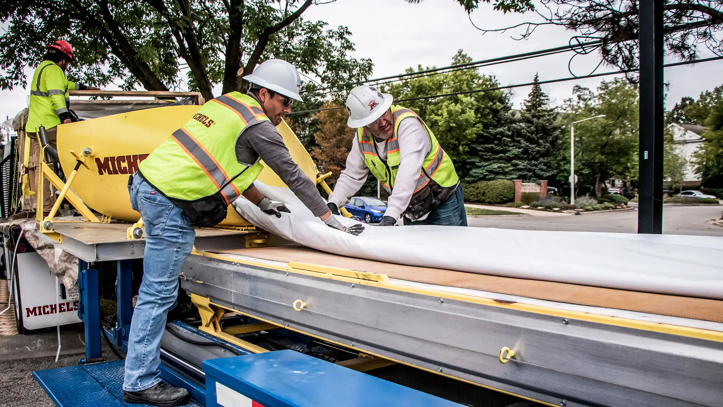 Crew members handle CIPP equipment