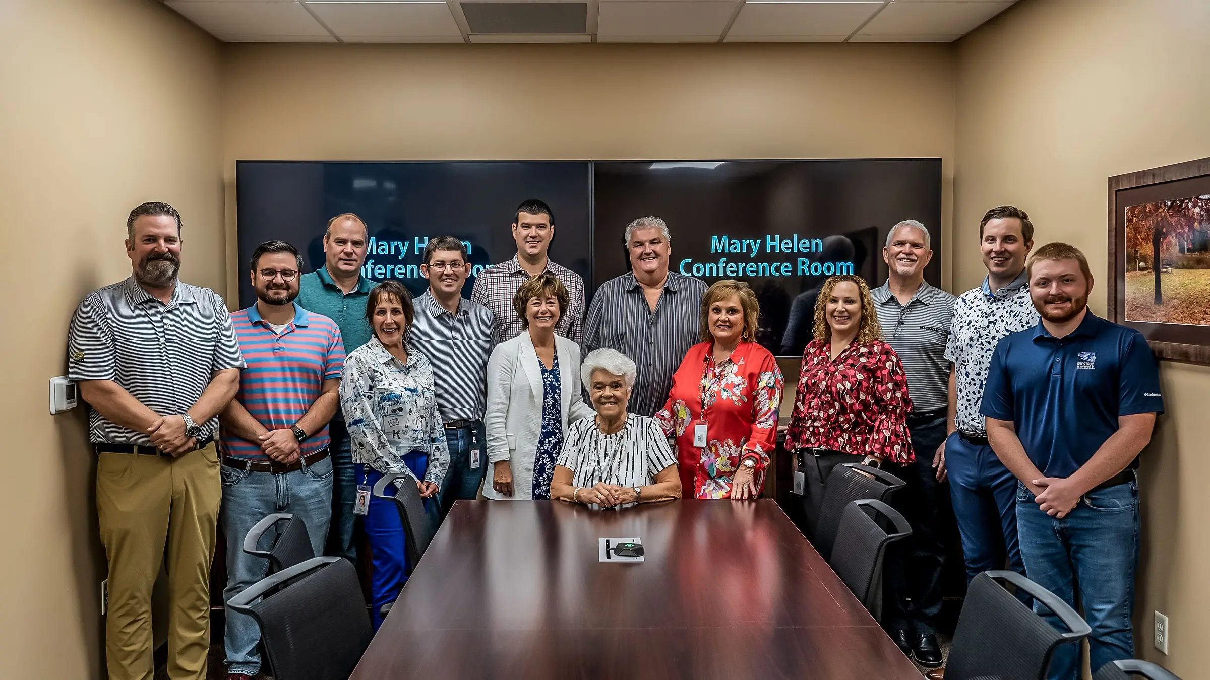 Group gathers in the new Mary Helen Conference room to celebrate