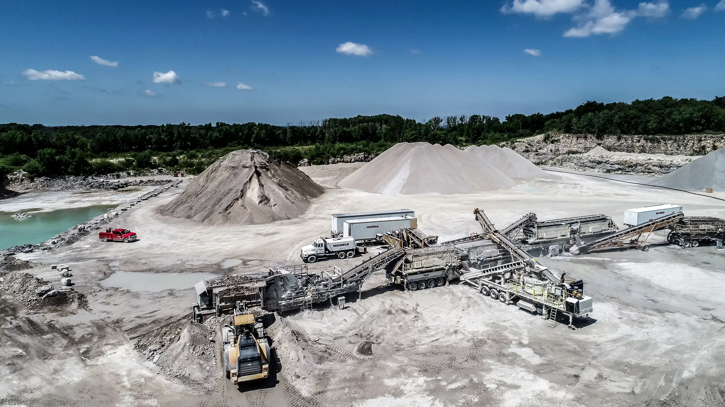 Aggregates being poured by a Michels dump truck.