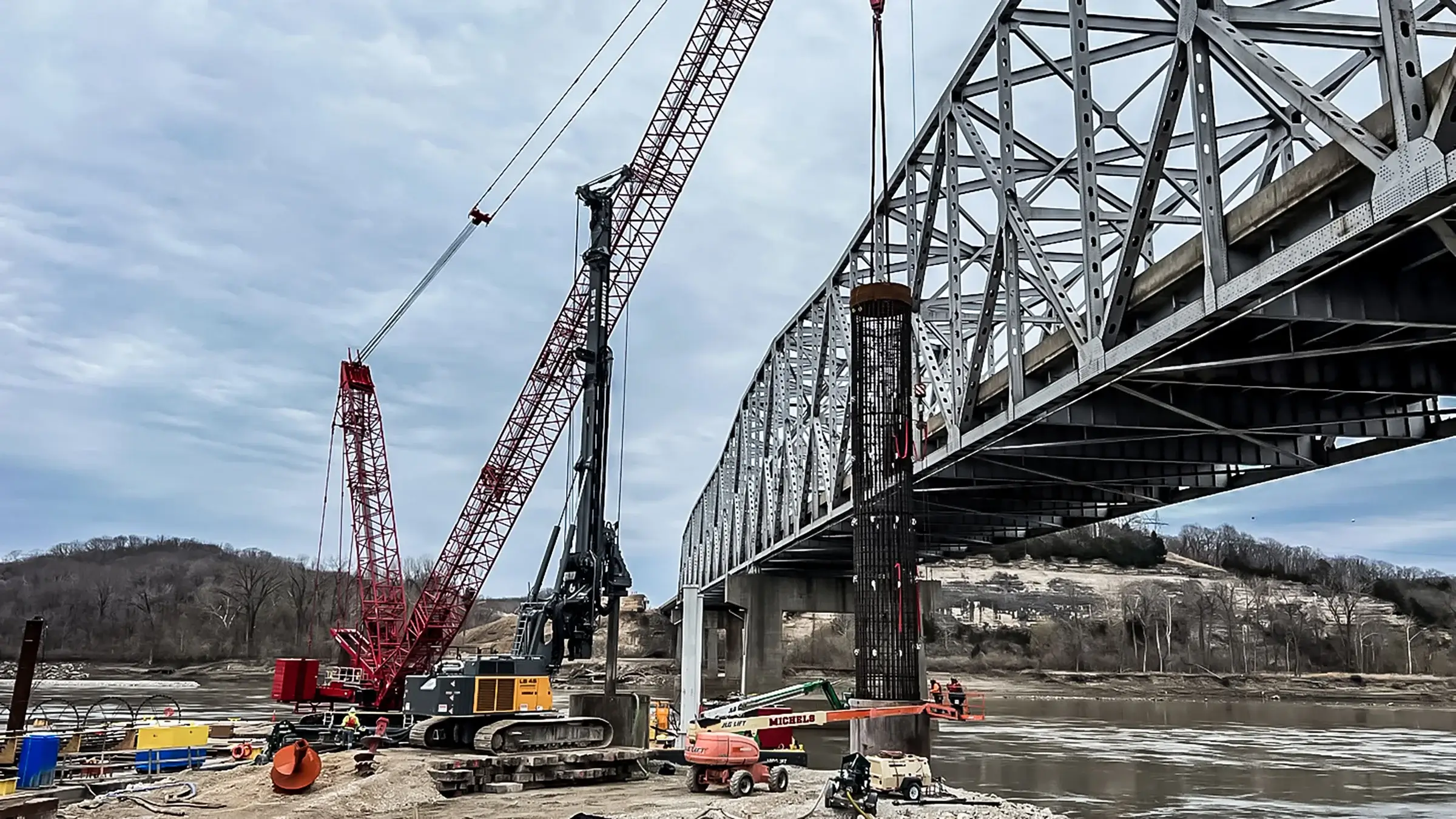 Cranes extended while working on a bridge in Rocheport Missouri