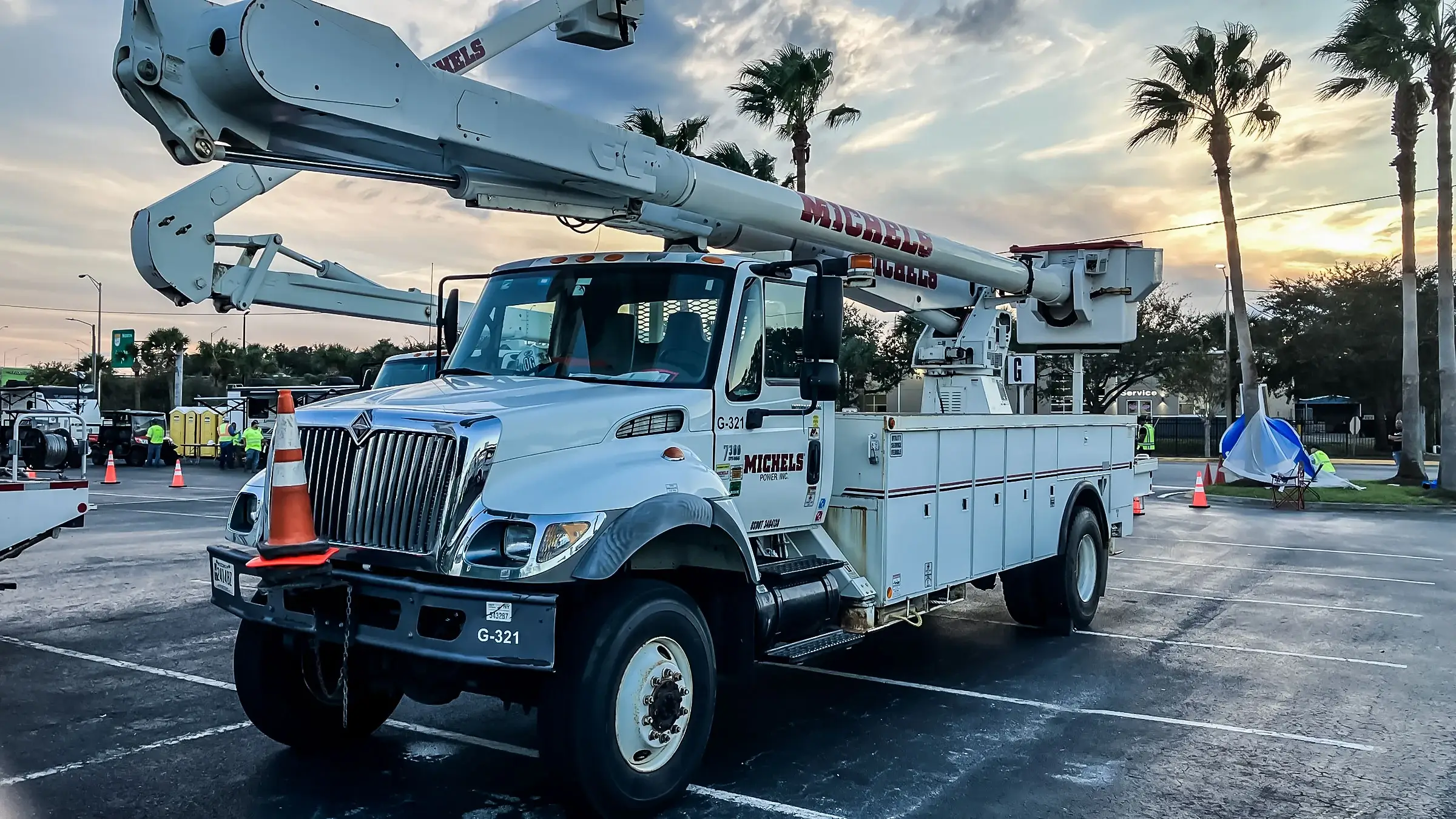 A Michels Power bucket truck in a Florida parking lot