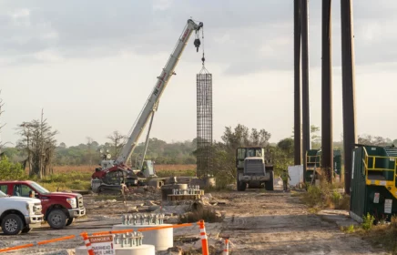 Power foundation piece held by crane