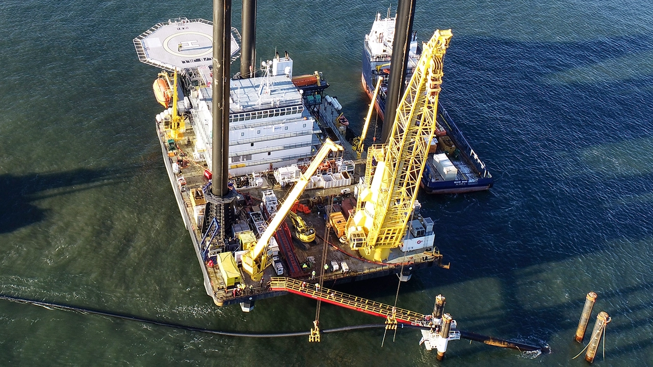 Offshore wind project site with a drill rig