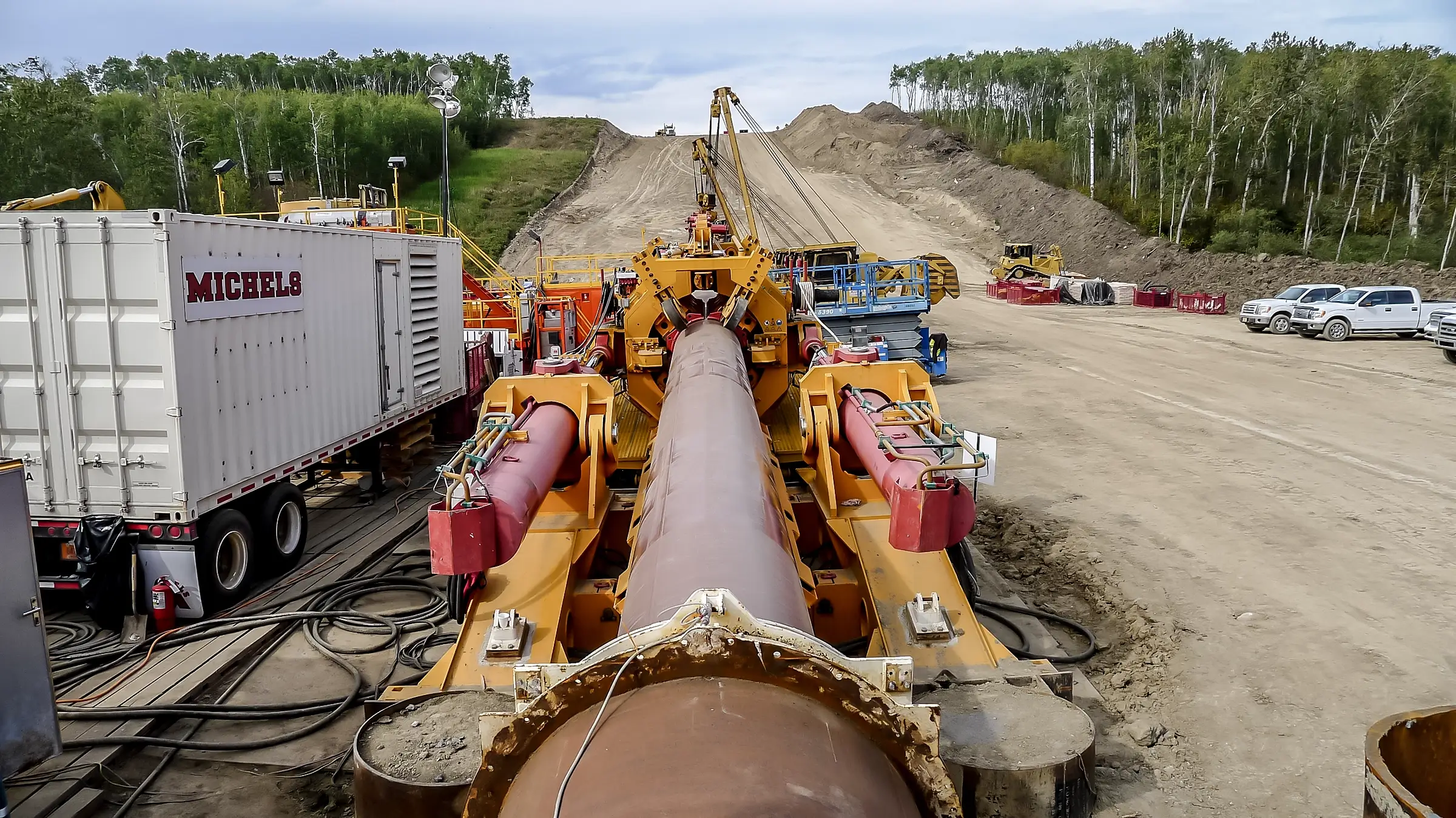 A direct pipe machine guides a large diameter pipe.