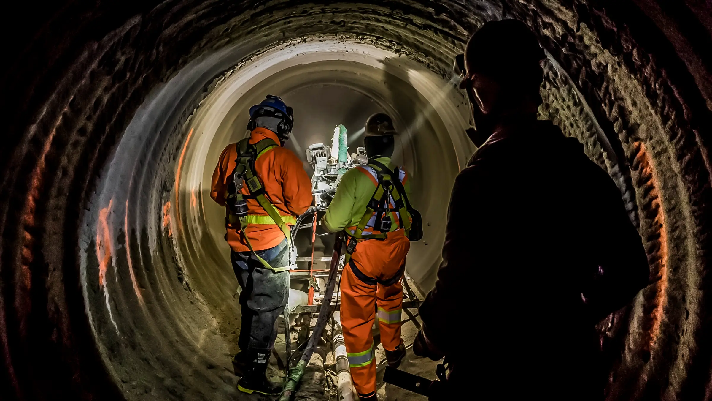 A crew repairs a deteriorated sanitary sewer pipe