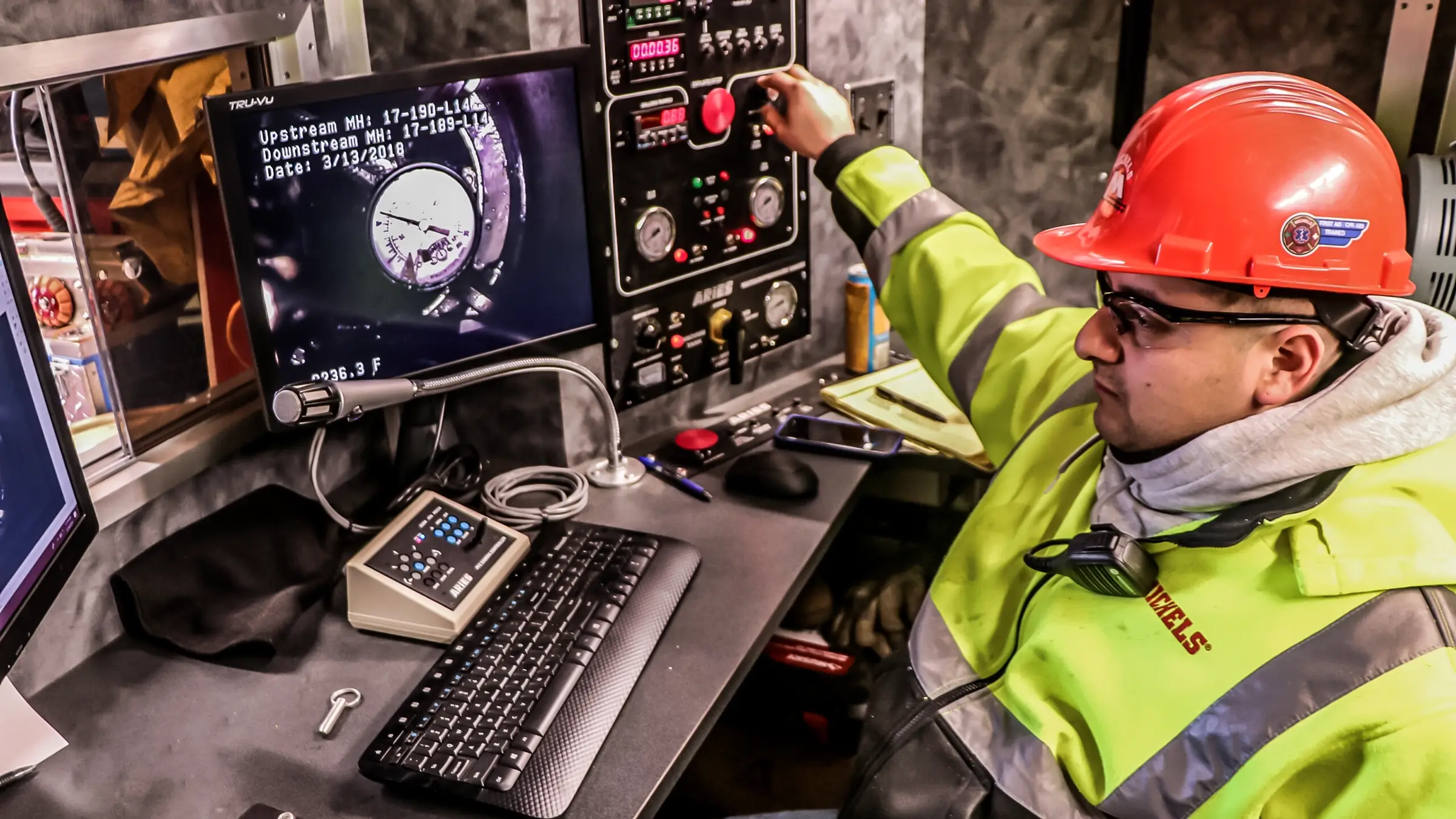 An operator remotely controls equipment as it installs chemical grouts in a void