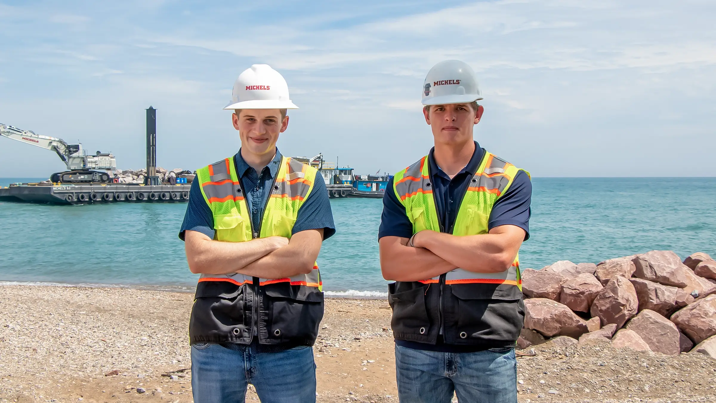 Interns stand by an offshore barge.