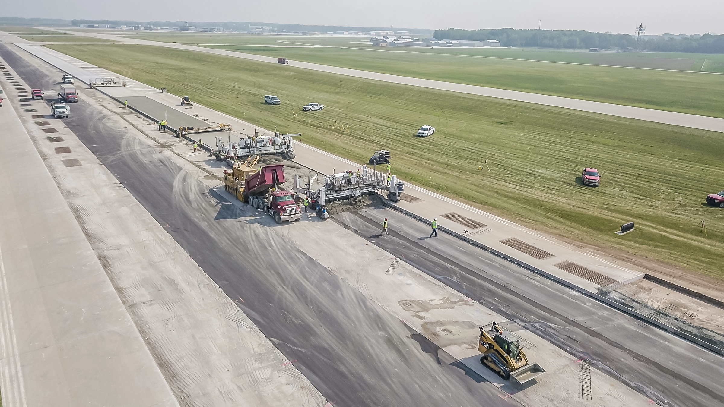 A Michels Road and Stone crew paves a runway at the Green Bay, WI airport.