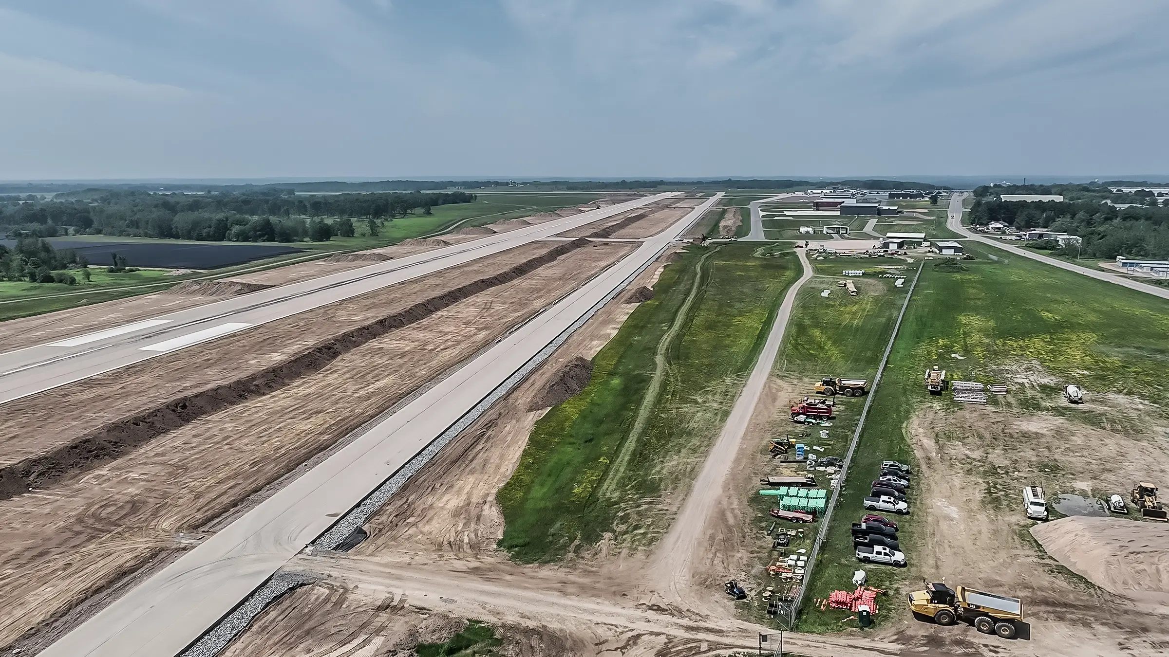 Central WI airport runway with construction alongside it.