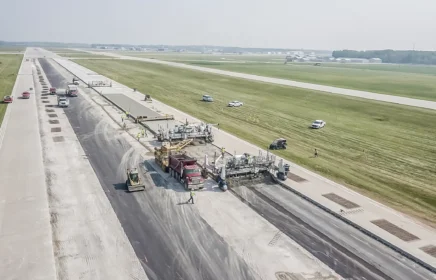 A paving crew operates t the Green Bay Airport.