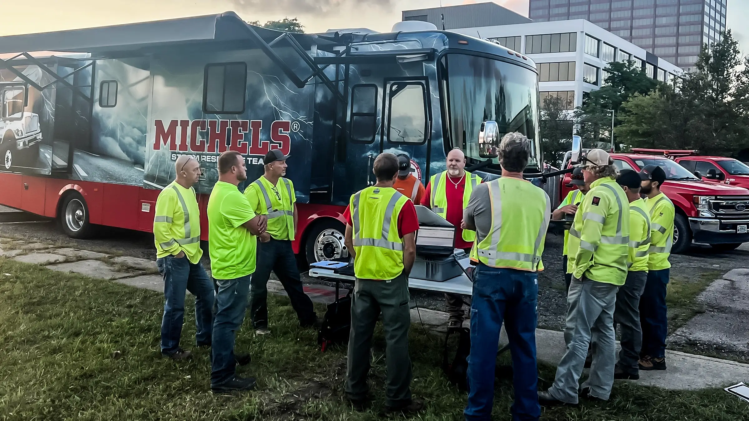 Michels Storm Response team huddles outside the response RV.