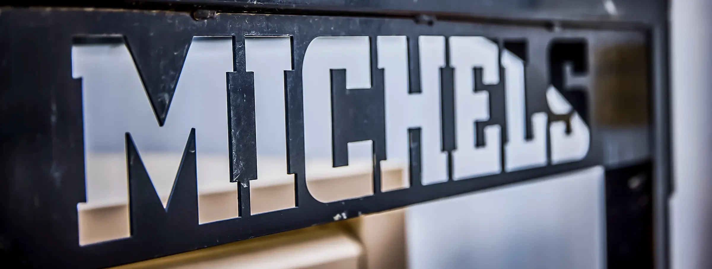 Michels logo on piece of equipment.