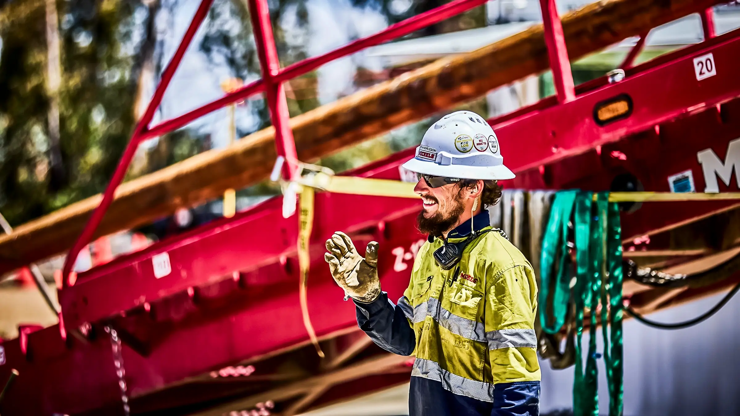 A Michels crew member saving near an HDD rig.